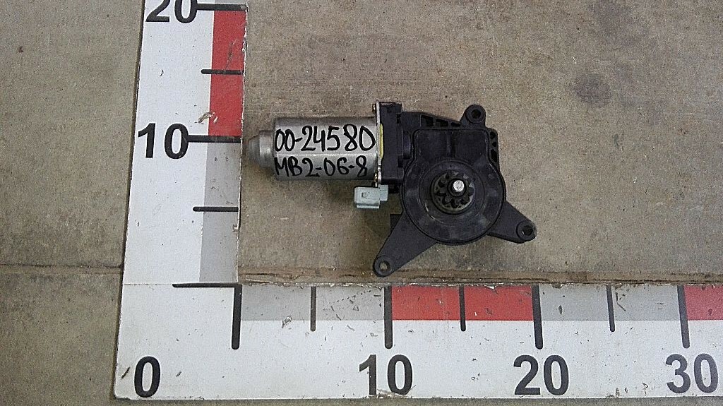 Моторчик левого стеклоподъемника б/у