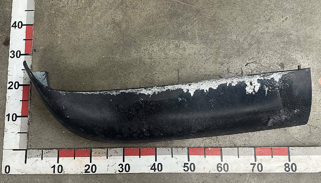 Спойлер бампера левый б/у