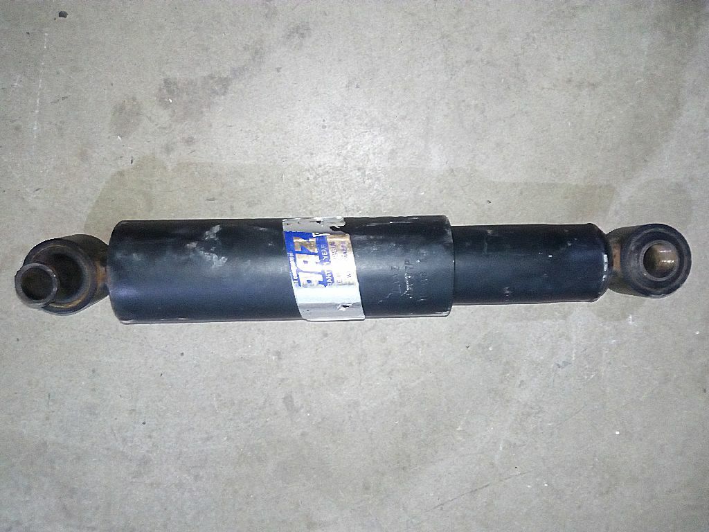 Амортизатор передней подвески б/у