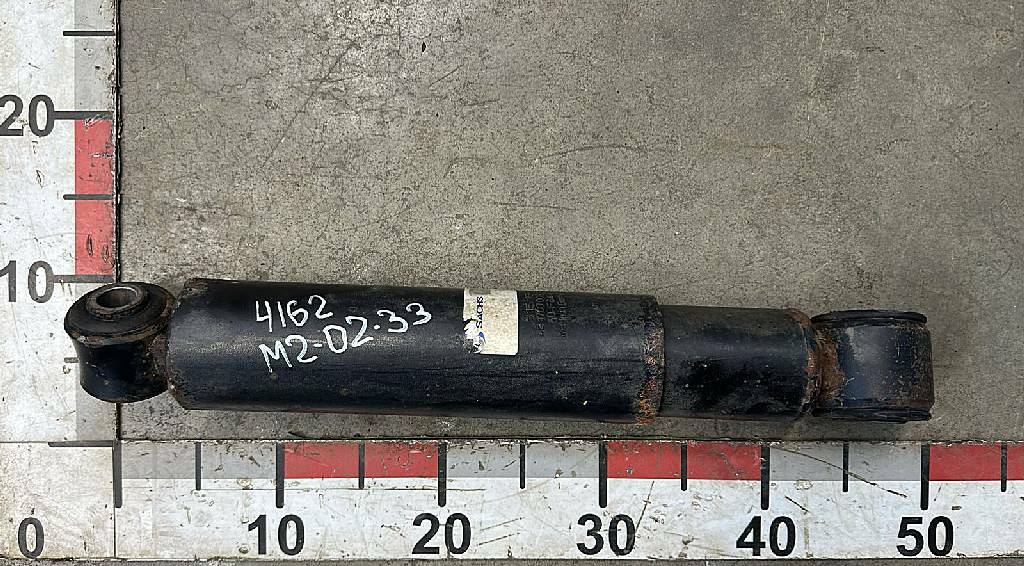 Амортизатор задней подвески б/у