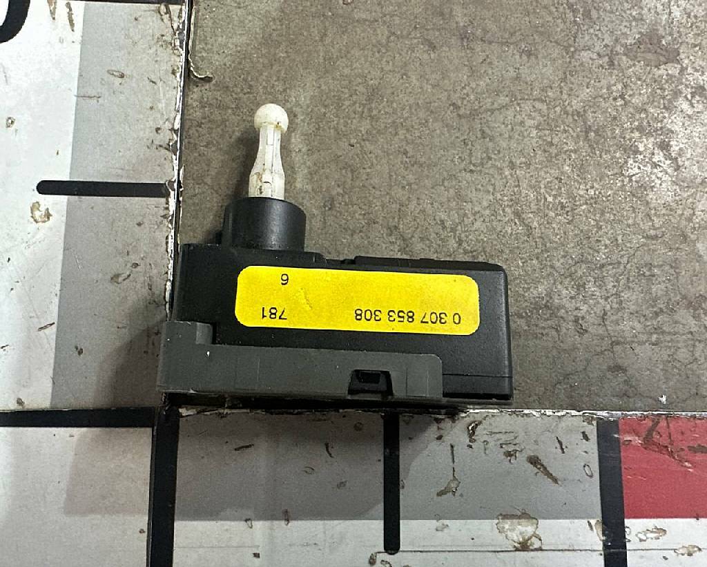 Моторчик корректора фар б/у